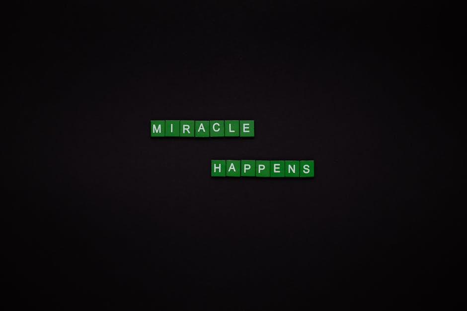 Motivational image featuring the words 'Miracle Happens' using green tiles on a black backdrop.